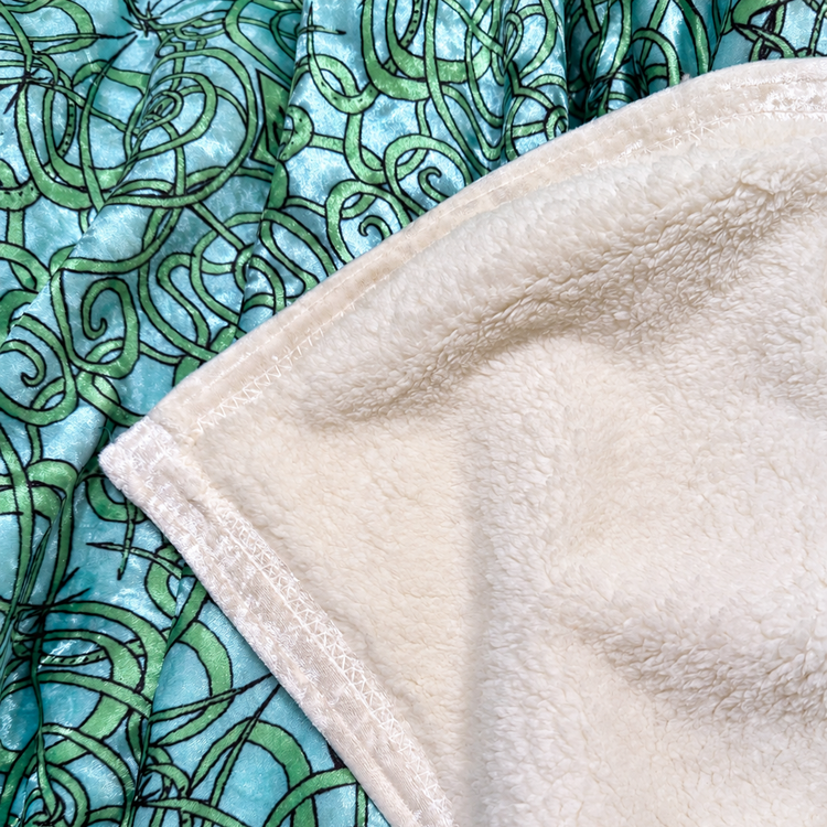 THE COZY DOUBLE FACED THROW BLANKET - MALIBU MONOGRAM