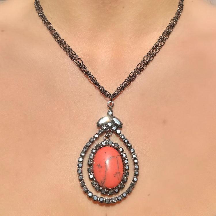 CORAL ECLIPSE NECKLACE