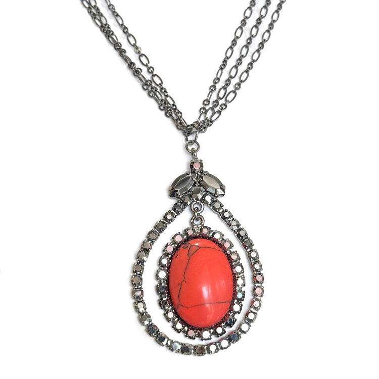 CORAL ECLIPSE NECKLACE