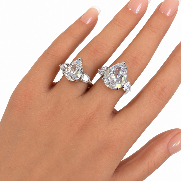 THREE STONE PEAR CUT RING