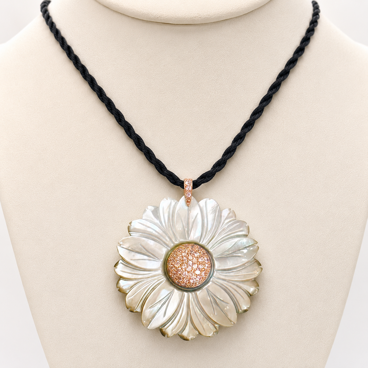 CARVED MOTHER OF PEARL PENDANT