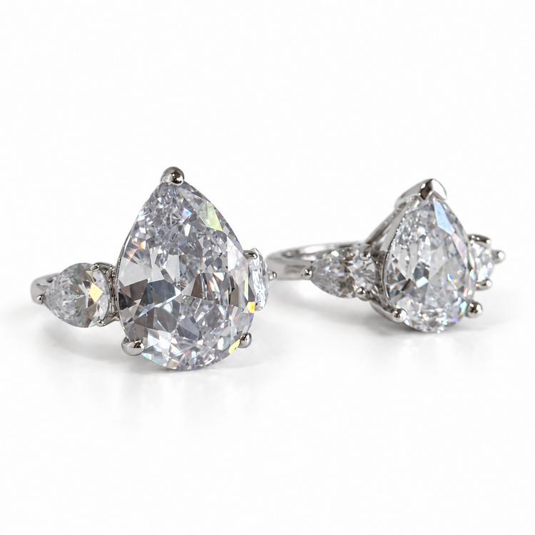 THREE STONE PEAR CUT RING