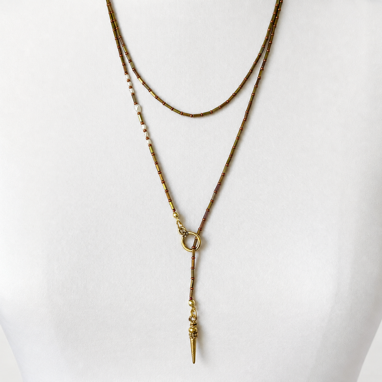 THE GOLDEN OUROBOROS NECKLACE