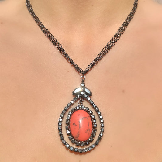 CORAL ECLIPSE NECKLACE