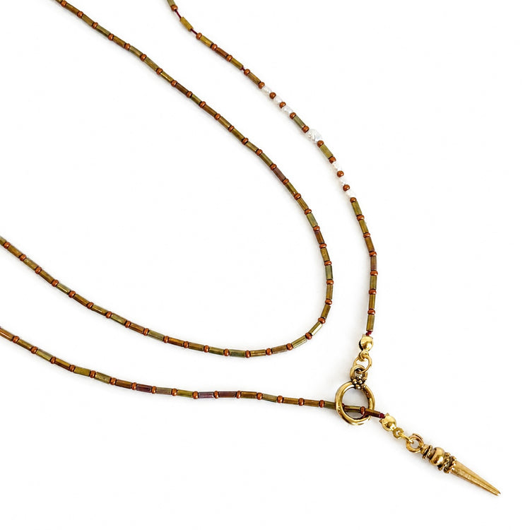 THE GOLDEN OUROBOROS NECKLACE